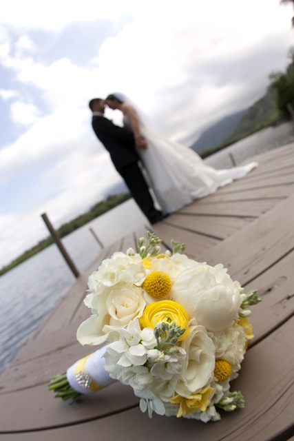 White w/ a touch of yellow for the brides bouquet and yellow w/ a hint of white in the bridesmaid bouquets! 